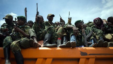 Des rebelles du M23 se retirent de Goma, dans l'est de la R&eacute;publique d&eacute;mocratique du Congo, le 1er d&eacute;cembre 2012. (PHIL MOORE / AFP)