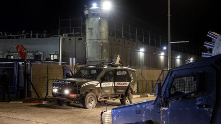 Israeli army vehicles outside the Ofer military prison in the occupied West Bank on November 29, 2023, amid preparations for the release of Palestinian prisoners in exchange for Israeli hostages held by Hamas in Gaza.  (FADEL SENNA / AFP)