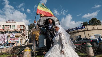 "On s'est mariés pendant Timkat parce qu'on voulait se souvenir de son importance dans notre relation", explique un jeune homme à l'AFP. Maintenant, "ce jour a une place spéciale dans nos cœurs".&nbsp; &nbsp; &nbsp; (EDUARDO SOTERAS / AFP)