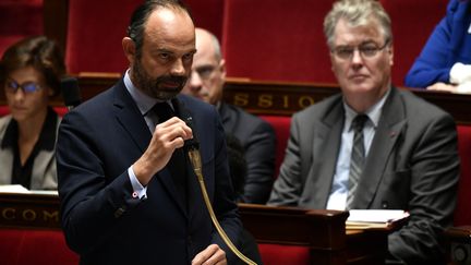 Edouard Philippe pendant la session des questions au gouvernement, à l'Assemblée nationale, le 8 octobre. (PHILIPPE LOPEZ / AFP)