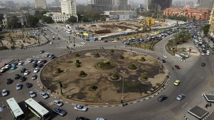 La circulation a repris sur la place Tahrir, au Caire (15 février 2011) (AFP / Pedro Ugarte)