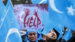 Lors d'une manifestation de soutien à la communauté ouïghoure, le 27 décembre 2019, à Berlin (Allemagne).&nbsp; (ABDULHAMID HOSBAS / ANADOLU AGENCY / AFP)