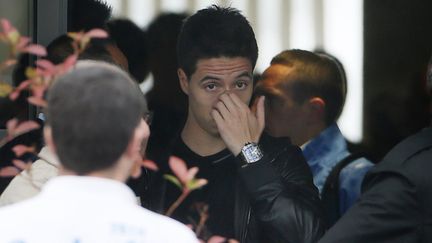 Samir Nasri, le 24 juin 2012 au Bourget (Seine-Saint-Denis), &agrave; son retour d'Ukraine. (KENZO TRIBOUILLARD / AFP)