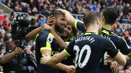 La joie des joueurs d'Arsenal après le but d'Olivier Giroud (LINDSEY PARNABY / AFP)