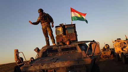 Le drapeau du Kurdistan irakien hissé à Sindjar