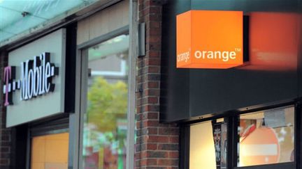 Boutiques Orange et T-Mobile à Liverpool. Les deux opérateurs vont s'allier au Royaume-Uni (septembre 09) (© AFP / Paul Ellis)