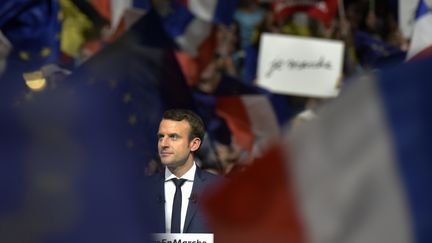 Le candidat à la présidentielle, Emmanuel Macron, lors d'un meeting à Lyon, le 4 février 2017. (JEAN-PHILIPPE KSIAZEK / AFP)