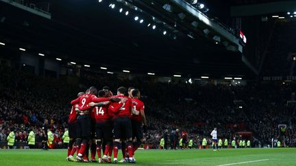 Les joueurs de Manchester United fêtent un but de leur attaquant Romelu Lukaku contre Bournemouth, en championnat d'Angleterre, le 30 décembre 2018, dans leur stade d'Old Trafford, à Manchester. (MATT WEST / BPI / REX / SIPA)