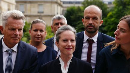 Les responsables du Nouveau Front populaire et Lucie Castets réagissent à la sortie du palais de l'Elysée, le 23 août 2024. (DIMITAR DILKOFF / AFP)