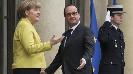 &nbsp; (Merkel et Hollande ont donné un point de presse commun ce vendredi© maxppp)