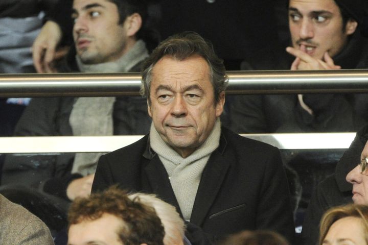 Michel Denisot, dans les tribunes du Parc des Princes le 22 décembre 2013. (JEAN MARIE HERVIO / DPPI MEDIA)