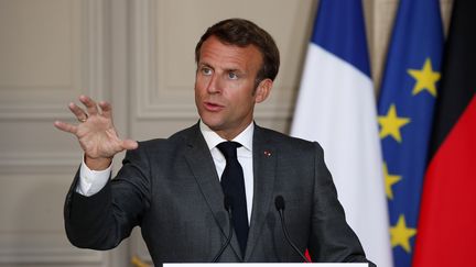 Emmanuel Macron, lors d'une conférence de presse à l'Elysée, le 18 mai 2020 à Paris. (FRANCOIS MORI / AFP)