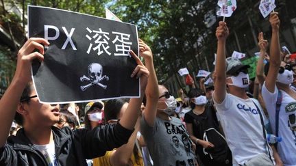 Manifestation en Chine, le 16 mai 2013 à Kunming, contre un projet pétrochimique visant à produire du paraxylène (PX). (AFP/IMAGINECHINA)