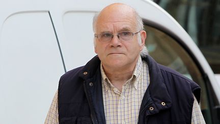 Henri Leclaire à son arrivée au palais de justice de Metz, le 5 août 2014.&nbsp; (FRED MARVAUX / AFP)