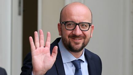  (Le libéral Charles Michel a prêté serment samedi matin devant le roi Philippe avant de se rendre au parlement pour un premier conseil des ministres © Maxppp)