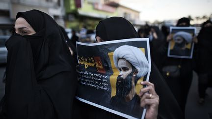 Des femmes manifestent contre l'exécution du cheikh Nimr Al-Nimr à Manama (Bahreïn), le 3 janvier 2016. (MOHAMMED AL-SHAIKH / AFP)