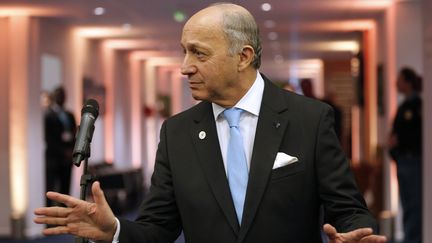 Le ministre des Affaires étrangères&nbsp;et président de la COP21, Laurent Fabius, le 11 décembre 2015 au Bourget. (? STEPHANE MAHE / REUTERS / X02520)