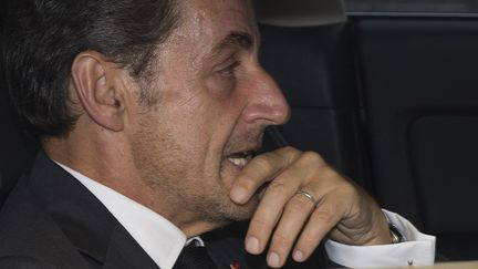 Nicolas Sarkozy quittant sur bureau parisien en voiture, le 19 septembre 2014. (JOEL SAGET / AFP)