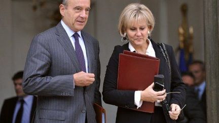 Alain Juppé et Nadine Morano quittent l'Elysée, le 19 octobre 2011. (AFP - Eric Feferberg)