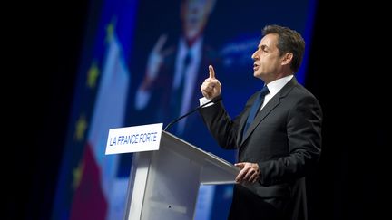 Le pr&eacute;sident candidat Nicolas sarkozy en meeting &agrave; Lyon (Rh&ocirc;ne), le 17 mars 2012. (LIONEL BONAVENTURE / AFP)