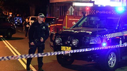 La police australienne dans la banlieue de Sydney, le 28 juillet 2017. (WILLIAM WEST / AFP)