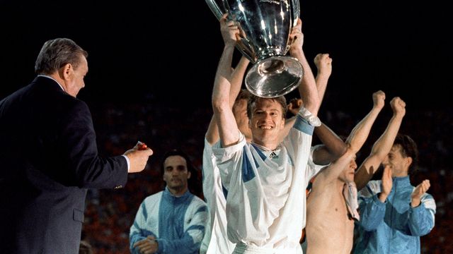 In difficulty in this final, midfielder Didier Deschamps becomes the first captain of a French team to lift a European Cup.  He won a second with Juventus Turin in 1996. (GEORGES GOBET / AFP)