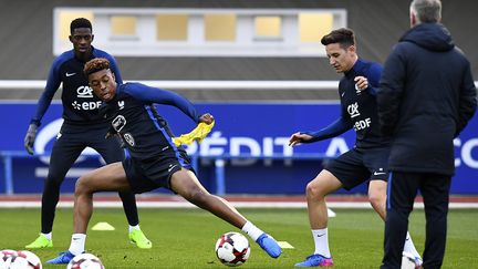  Presnel Kimpembe et Florian Thauvin, lors d'une précédente séance d'entraînement (FRANCK FIFE / AFP)