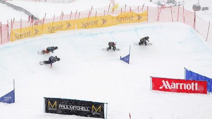 Le snowboardcross, épreuve spectaculaire (DOUG PENSINGER / GETTY IMAGES NORTH AMERICA)