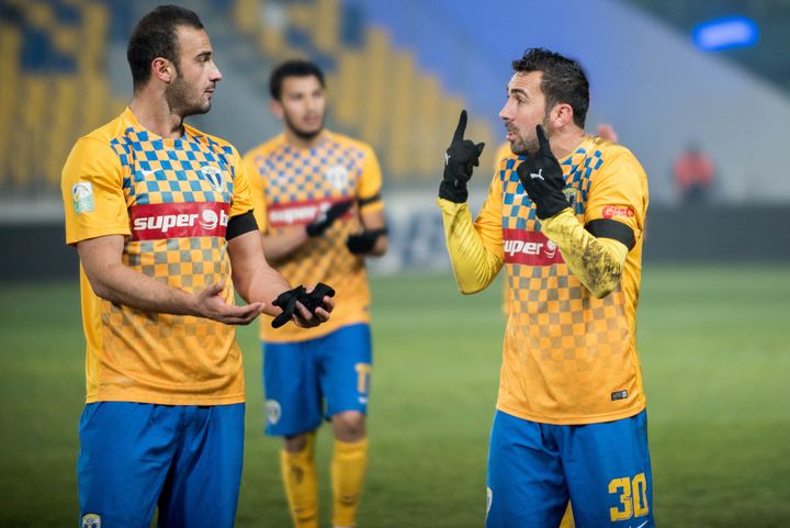 Des joueurs du FC Petrolul Ploiesti, relégué en deuxième division roumaine à l'issue de la saison 2015-2016 en raison de problèmes financiers et judiciaires. (CATALIN SOARE / NURPHOTO / AFP)