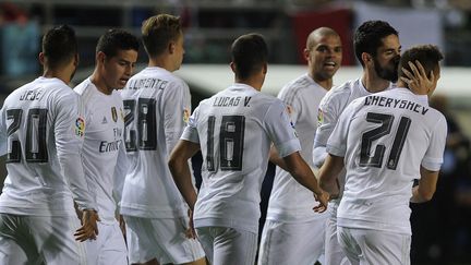 Denis Cheryshev (à droite, n°21) était suspendu au moment du 16e de finale  (CRISTINA QUICLER / AFP)