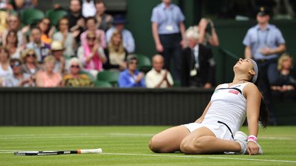 Bartoli sur la pelouse londonienne (GLYN KIRK / AFP)