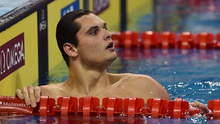  (Florent Manaudou n'a pas réussi à remplir son  objectif de remporter trois titres en individuel aux Mondiaux-2014 de natation en petit bassin, terminant à la deuxième place du 100 m nage libre derrière le Brésilien Cielo © Maxppp)