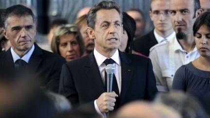 Nicolas Sarkozy s'exprimant devant les salariés d'une entreprise de transport près de Saint-Etienne le 6 septembre 2011 (AFP - PHILIPPE DESMAZES)