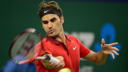 Roger Federer et son magnifique coup droit (YU JIANZHONG / IMAGINECHINA)