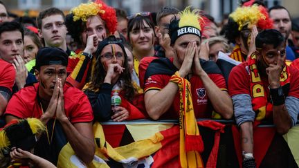 Supporters des Diables rouges le 10 juillet 2018 à Bruxelles. (ARIS OIKONOMOU / AFP)