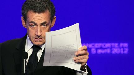 Nicolas Sarkozy lors de la pr&eacute;sentation de son programme, le 5 avril 2012 &agrave; Paris. (KENZO TRIBOUILLARD / AFP)