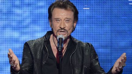 Johnny Hallyday au 26e Téléthon (7 décembre 2012)
 (Bertrand Guay / AFP)