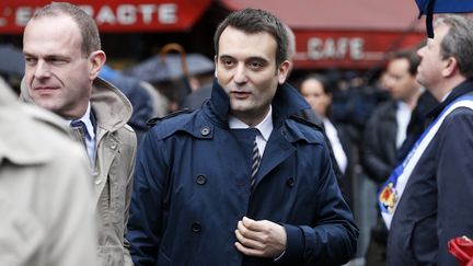 Florian Philippot lors du d&eacute;fil&eacute; du Front national &agrave; Paris, le 1er mai 2015. (THOMAS SAMSON / AFP)