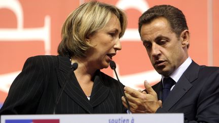 Marie-Anne Montchamp et Nicolas Sarkozy, le 23 septembre 2005. (MAXPPP)