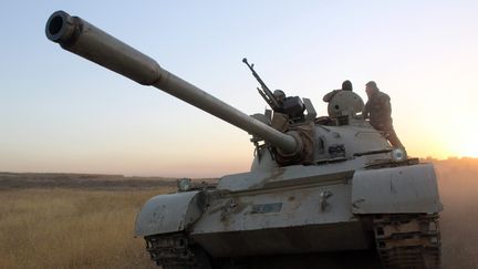 Des combattants peshmergas kurdes pendant l'offensive sur Mossoul. (JASER JAWAD / MAXPPP)