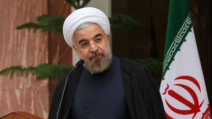 Le pr&eacute;sident iranien, Hassan Rouhani, donne une conf&eacute;rence de presse apr&egrave;s la conclusion d'un accord avec la communaut&eacute; internationale sur le programme iranien du pays, le 24 novembre 2013 &agrave; T&eacute;h&eacute;ran (Iran). (PRESIDENCE IRANIENNE / AFP)