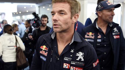 Sébastien Loeb débarque dans le monde des rallye-raids avec Peugeot (FRANCK FIFE / AFP)