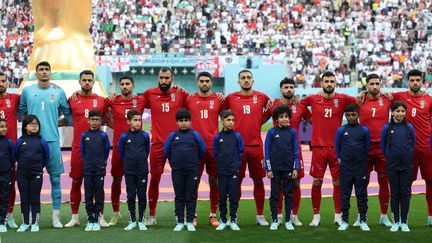 Les joueurs de l'équipe d'Iran ont refusé de chanter&nbsp;l'hymne national lors de leur match contre l'Angleterre, lors de la Coupe du Monde, le 21 novembre 2022. (FADEL SENNA / AFP)