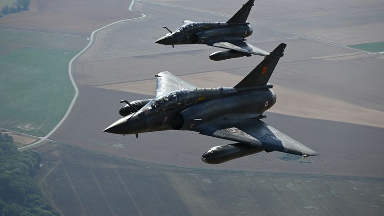 Two Mirage 2000 D in demonstration, July 14, 2022. (CHRISTOPHE SIMON / AFP)