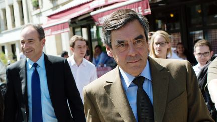 L'ex-Premier ministre Fran&ccedil;ois Fillon (D) et le pr&eacute;sident de l'UMP, Jean-Fran&ccedil;ois Cop&eacute;, le 24 avril 2013 &agrave; Paris. (MARTIN BUREAU / AFP)