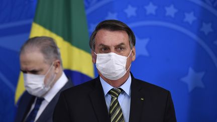 Le président brésilien, Jair Bolsonaro, le 18 mars 2020 à Brasilia (Brésil). (MATEUS BONOMI / AGIF / AFP)