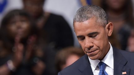 Le président américain, Barack Obama, lors d'une cérémonie en hommage aux victimes de la fusillade de Dallas (Etats-Unis), le 12 juillet 2016. (MANDEL NGAN / AFP)