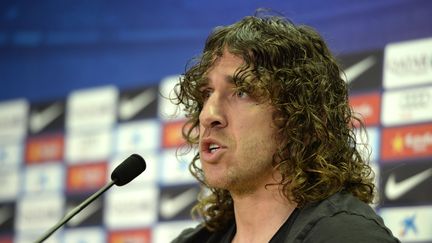 Carles Puyol annonce, le 4 mars 2014, qu'il quittera son club, le FC Barcelone, &agrave; la fin de la saison.&nbsp; (LLUIS GENE / AFP)