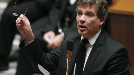 Le ministre du Redressement productif, Arnaud Montebourg, &agrave; l'Assembl&eacute;e nationale, le 7 janvier 2014. (PATRICK KOVARIK / AFP)