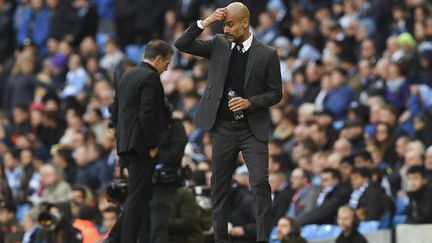 Guardiola n'avait pas aligné cinq matchs sans victoire depuis 2009. (PAUL ELLIS / AFP)